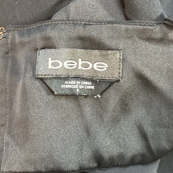 Bebe Jumpsuit Black Wide Split Leg V-Neck Stretch Peek a boo Back Women's Size 8 - Picture 3 of 7